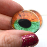 High Domed Orange and Green Human Glass Eyes