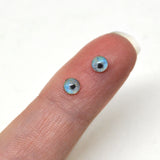 snow leopard glass eye