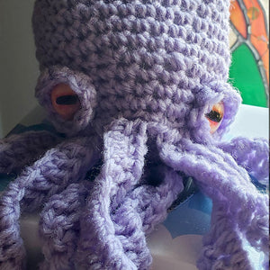 Crochet Octopus Friend Made with Orange Glass Button Eyes