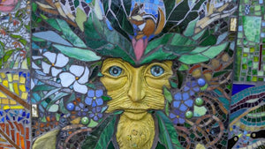 Community Mosaic of Green Man Organized by Artist Lisa Tiemann Created with Glass Eyes by Megan Petersen