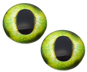 Two green and yellow dragon glass eyes on a white background