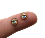 Bejeweled Glass Eyes