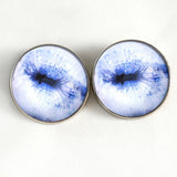 Contracted pale blue goat sew on glass eyes