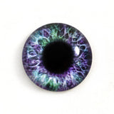 purple and green glass eye