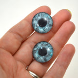 blue human glass eye