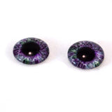 purple and green glass eyes